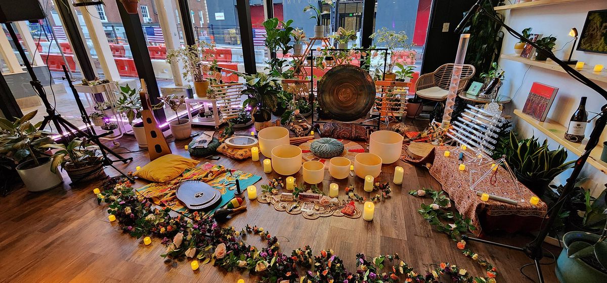 Candlelit ceremony setup on the floor of the event space at Stem & Vine, Baltimore