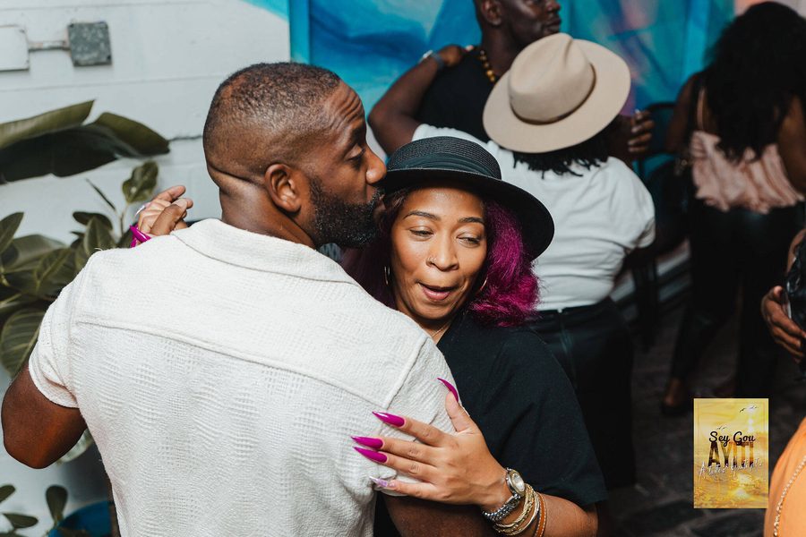 Couple dancing close during an evening event at Stem & Vine in Baltimore