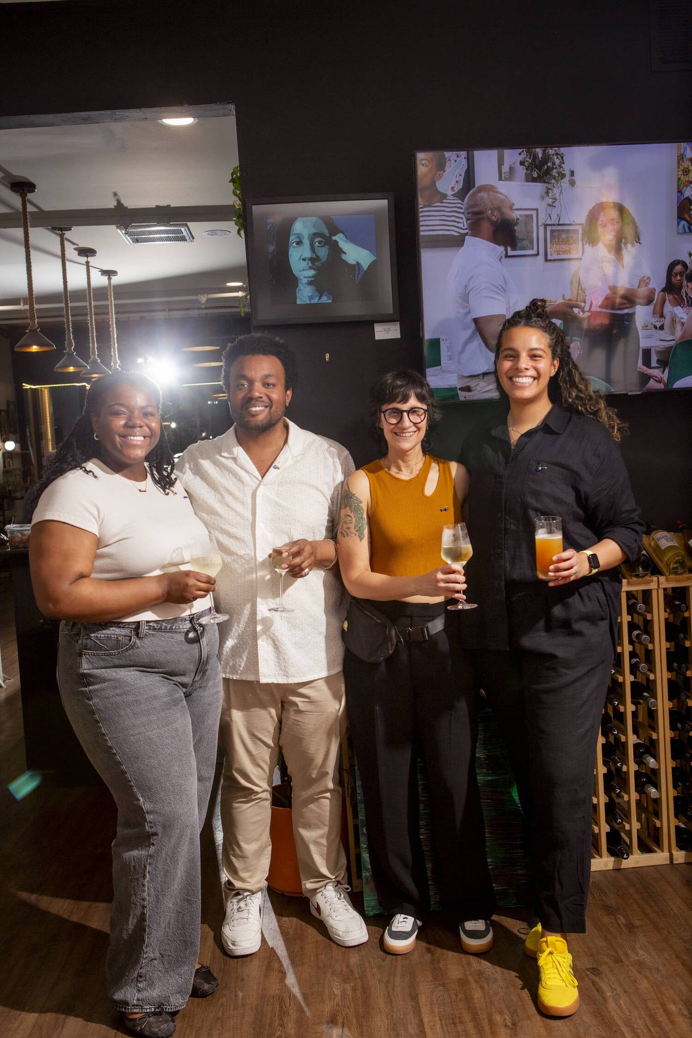 Friends raising a toast at a private party at Stem & Vine in Baltimore
