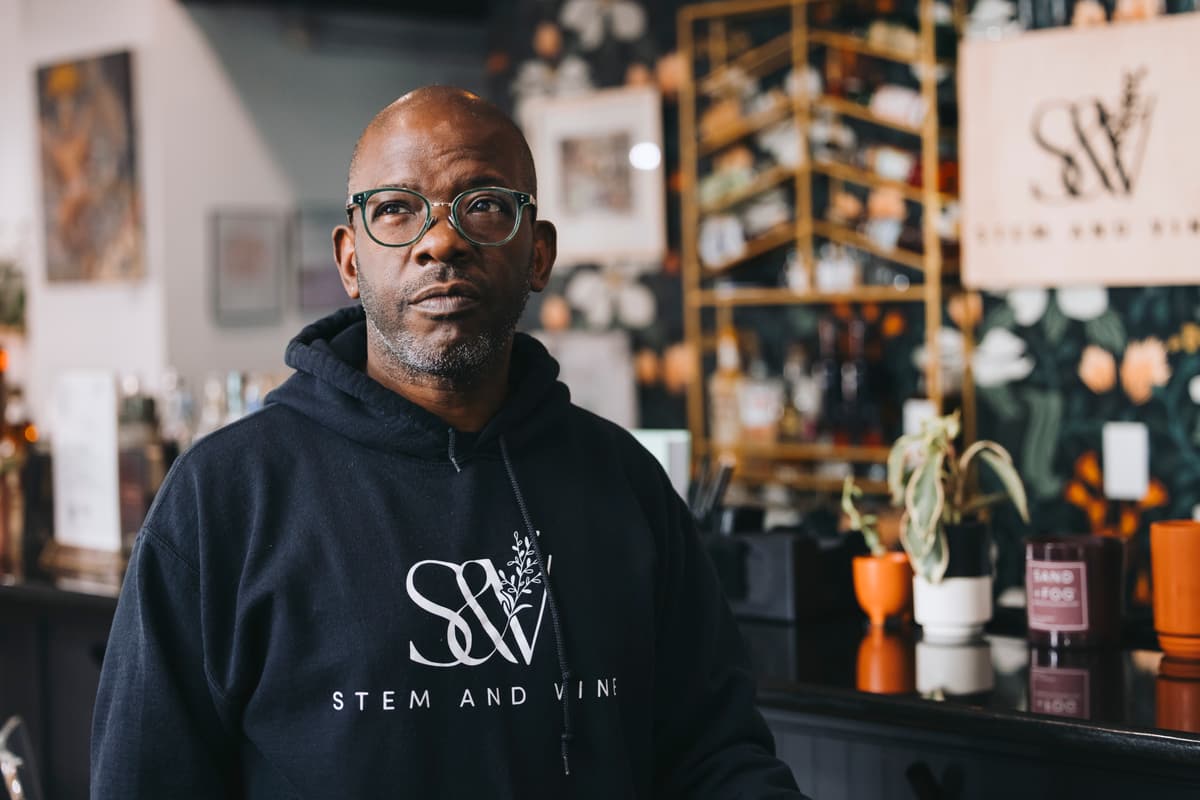 Quincy Goldsmith, co-owner of Stem & Vine, standing in the shop in downtown Baltimore